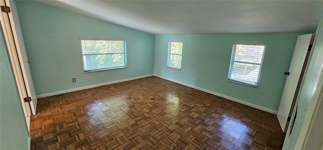17932 Wendy Sue Ave, Hudson, FL 34667 - spare room with lofted ceiling and baseboards