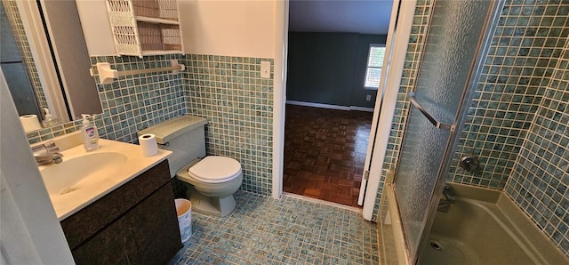 17932 Wendy Sue Ave, Hudson, FL 34667 - full bath with tile walls, vanity, tub / shower combination, and a wainscoted wall