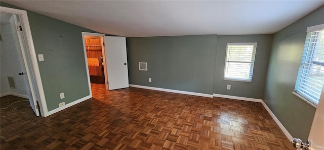 17932 Wendy Sue Ave, Hudson, FL 34667 - unfurnished room featuring lofted ceiling and baseboards