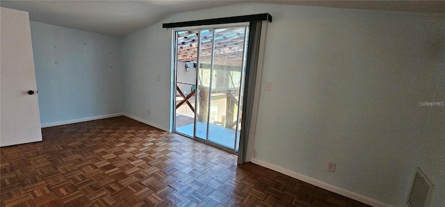17932 Wendy Sue Ave, Hudson, FL 34667 - unfurnished room featuring baseboards and vaulted ceiling