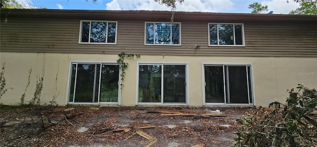 17932 Wendy Sue Ave, Hudson, FL 34667 - rear view of property with stucco siding