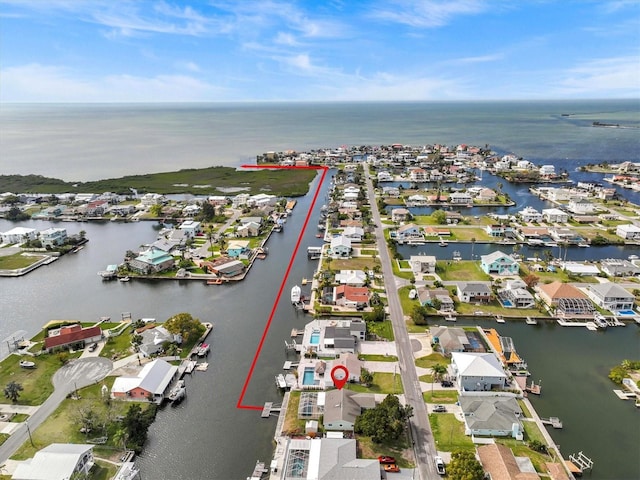 aerial view featuring a water view and a residential view