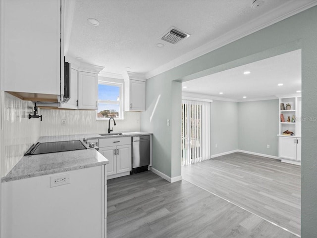 kitchen featuring a sink, visible vents, white cabinetry, ornamental molding, and dishwasher