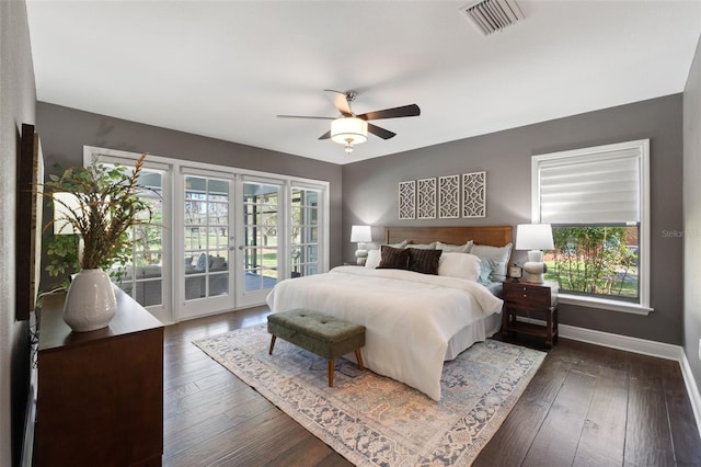 bedroom with hardwood / wood-style floors, access to exterior, french doors, and visible vents