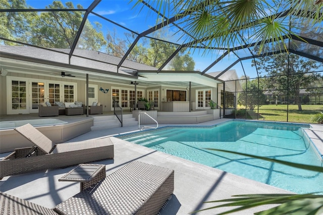 pool with an outdoor living space, french doors, a patio, and ceiling fan