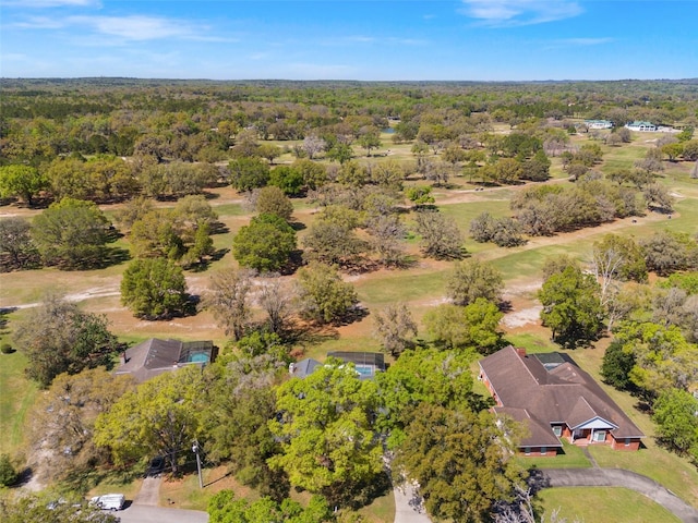 bird's eye view featuring a view of trees