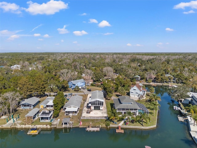 bird's eye view featuring a residential view and a water view