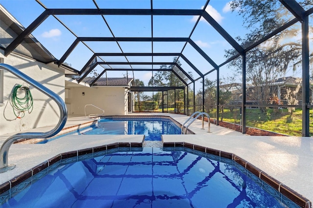 outdoor pool featuring a lanai and a patio area