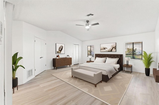 1011 Altoona Ave, Spring Hill, FL 34609 - bedroom featuring vaulted ceiling, light wood-style floors, and a ceiling fan