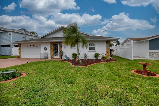 ranch-style house featuring an attached garage, fence, a front lawn, and concrete driveway