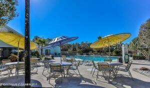 exterior space with a community pool