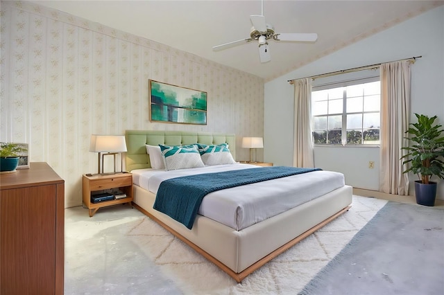 bedroom featuring wallpapered walls, ceiling fan, and vaulted ceiling