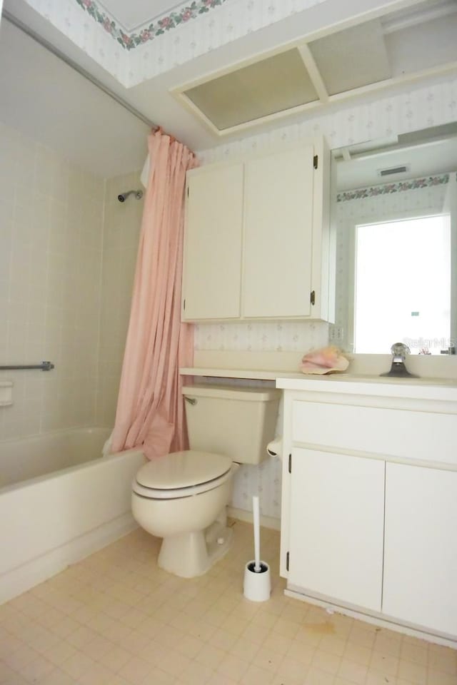 full bathroom featuring toilet, wallpapered walls, shower / bath combo, and vanity