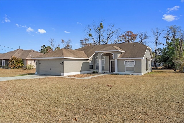 ranch-style home featuring a garage, concrete driveway, a front lawn, and stucco siding