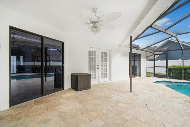 view of pool with french doors