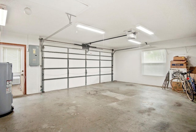 garage featuring electric panel, electric water heater, and a garage door opener