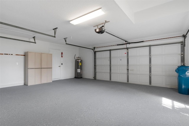 garage with electric water heater and a garage door opener