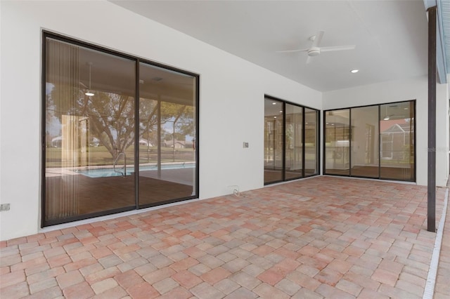 view of patio with a ceiling fan