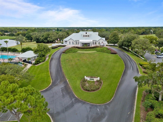 birds eye view of property with a water view