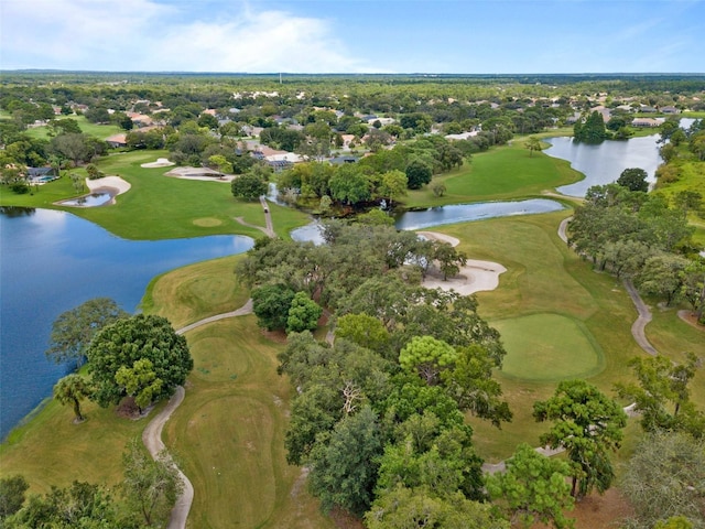 bird's eye view featuring view of golf course and a water view