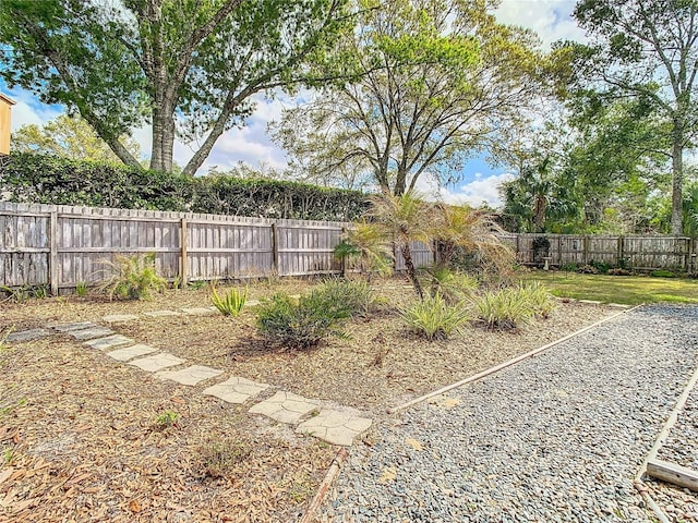 view of yard featuring a fenced backyard