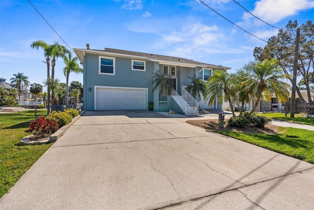 view of front of home featuring driveway and an attached garage