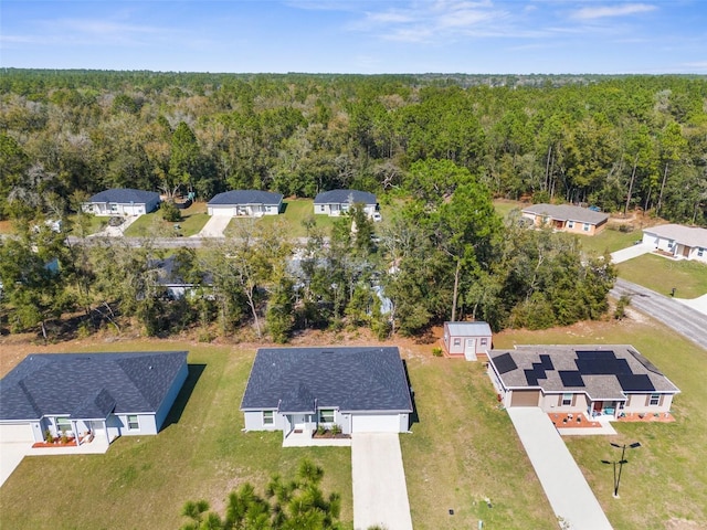 bird's eye view with a view of trees