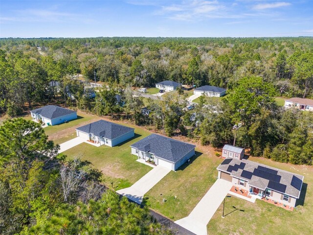 aerial view featuring a view of trees