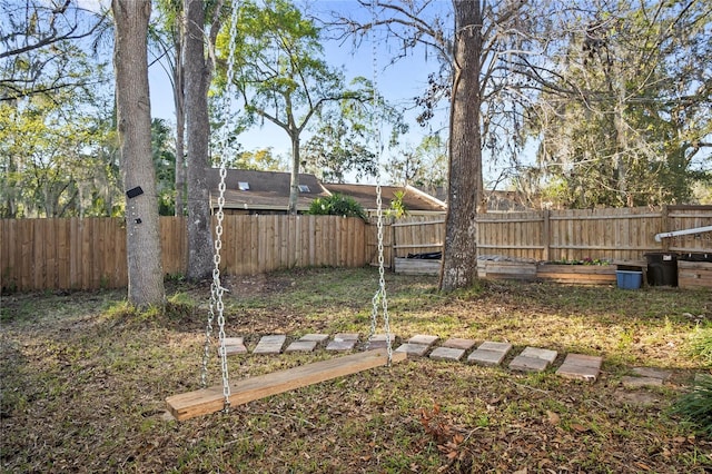 view of yard featuring a fenced backyard