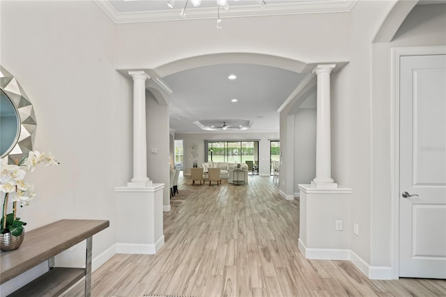 3130 Forsythia Dr, Odessa, FL 33556 - corridor with ornate columns, arched walkways, crown molding, baseboards, and recessed lighting