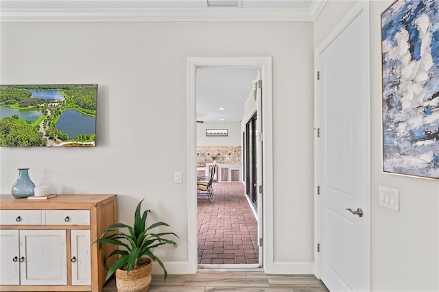 3130 Forsythia Dr, Odessa, FL 33556 - hall with ornamental molding, baseboards, and light wood finished floors