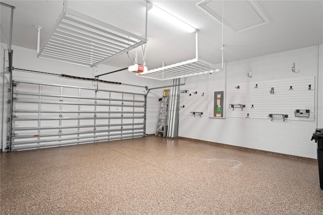 3130 Forsythia Dr, Odessa, FL 33556 - garage with electric panel, baseboards, and a garage door opener