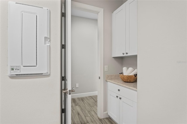 3130 Forsythia Dr, Odessa, FL 33556 - hallway with light wood-style flooring and baseboards