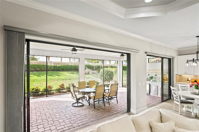 3130 Forsythia Dr, Odessa, FL 33556 - dining area featuring crown molding, a ceiling fan, recessed lighting, a chandelier, and baseboards