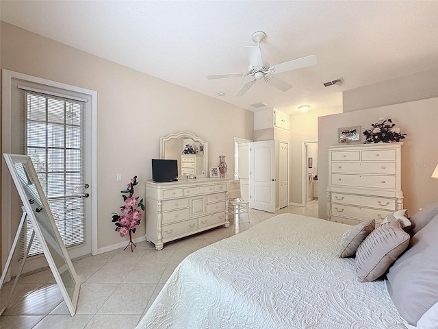 bedroom featuring light tile patterned floors, lofted ceiling, a ceiling fan, visible vents, and baseboards