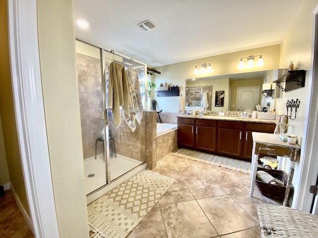 full bath with double vanity, visible vents, a garden tub, tile patterned flooring, and a shower stall