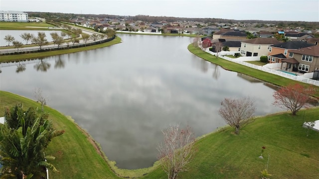 aerial view with a residential view and a water view