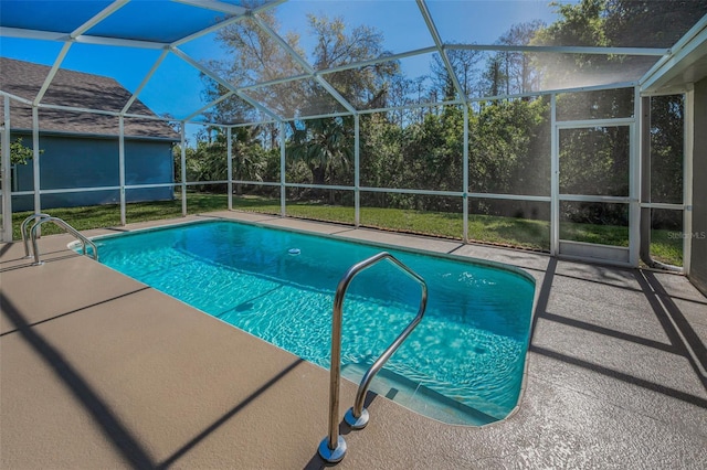 outdoor pool featuring a lanai and a patio