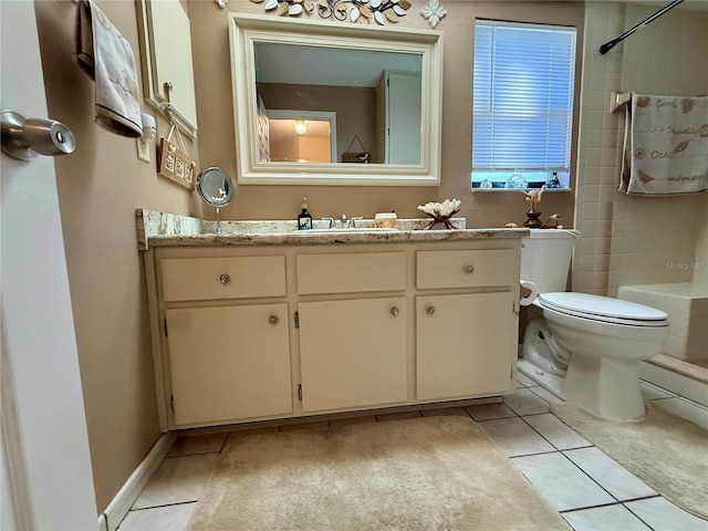 full bathroom featuring vanity, toilet, and tile patterned floors