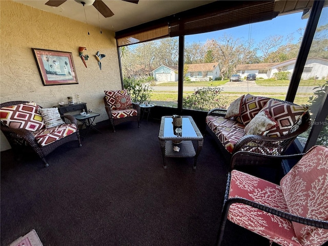 sunroom with ceiling fan