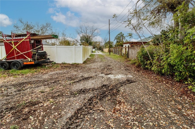 view of yard with fence