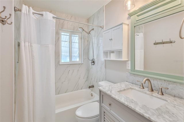 full bathroom with toilet, shower / bath combination with curtain, and vanity