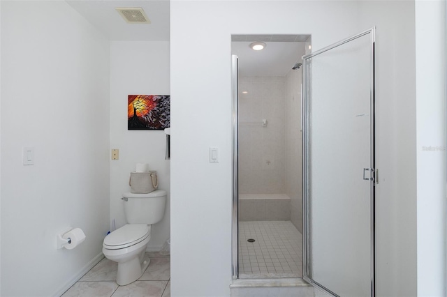 full bathroom with visible vents, toilet, a shower stall, baseboards, and tile patterned floors