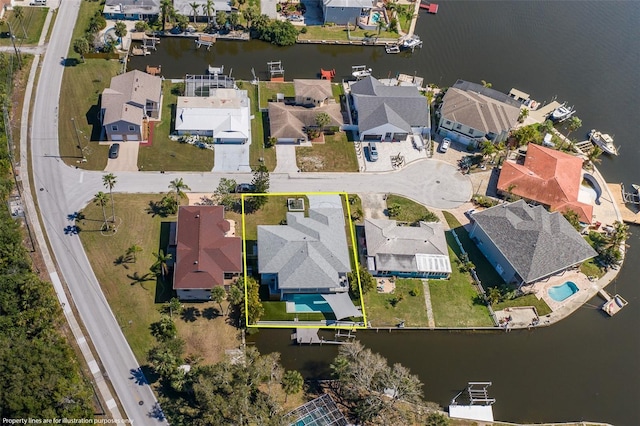 bird's eye view with a water view and a residential view