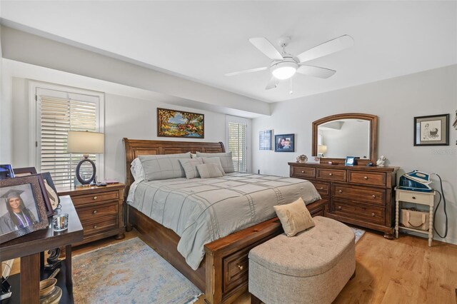 bedroom featuring ceiling fan and light wood finished floors