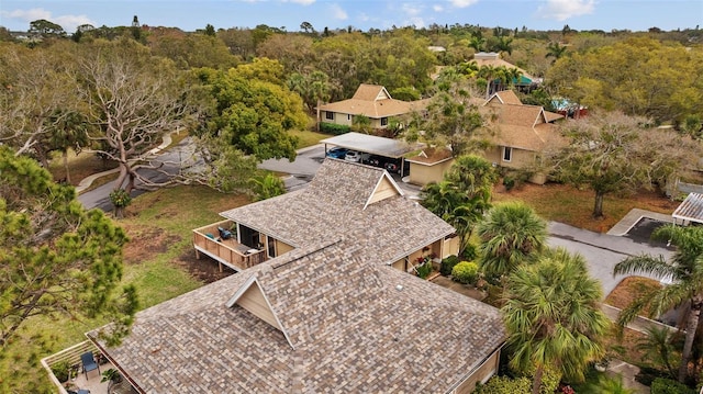 aerial view with a wooded view