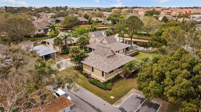 drone / aerial view with a residential view