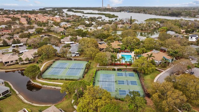 aerial view featuring a water view and a residential view