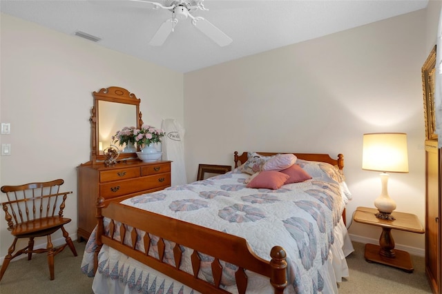 bedroom with a ceiling fan, carpet flooring, baseboards, and visible vents