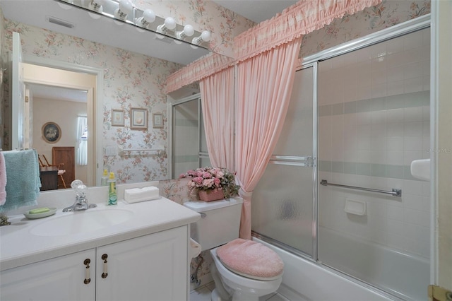 bathroom with enclosed tub / shower combo, toilet, wallpapered walls, and vanity